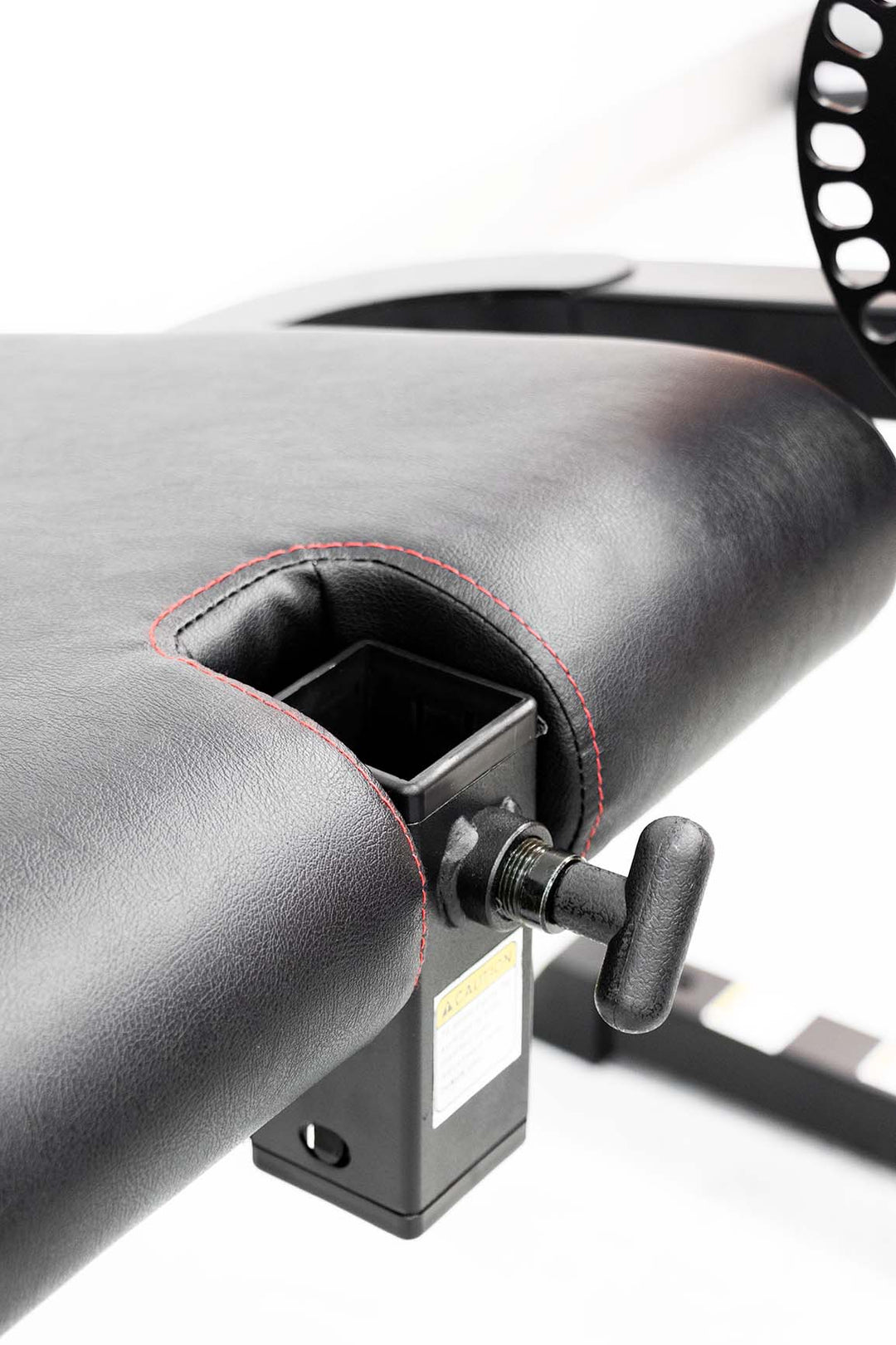 adjustment dial on front of gym chair