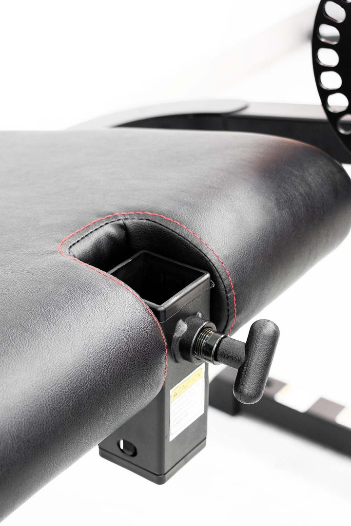 adjustment dial on front of gym chair